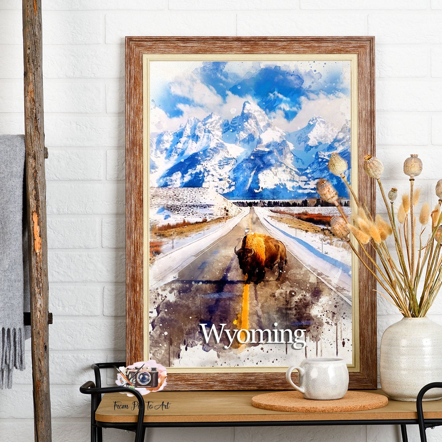 Watercolor_Portrait_of_Wyoming_featuring_a_majestic_bison_crossing_a_snowy_road_with_the_iconic_Teton_mountains_in_the_background_by_FromPicToArt