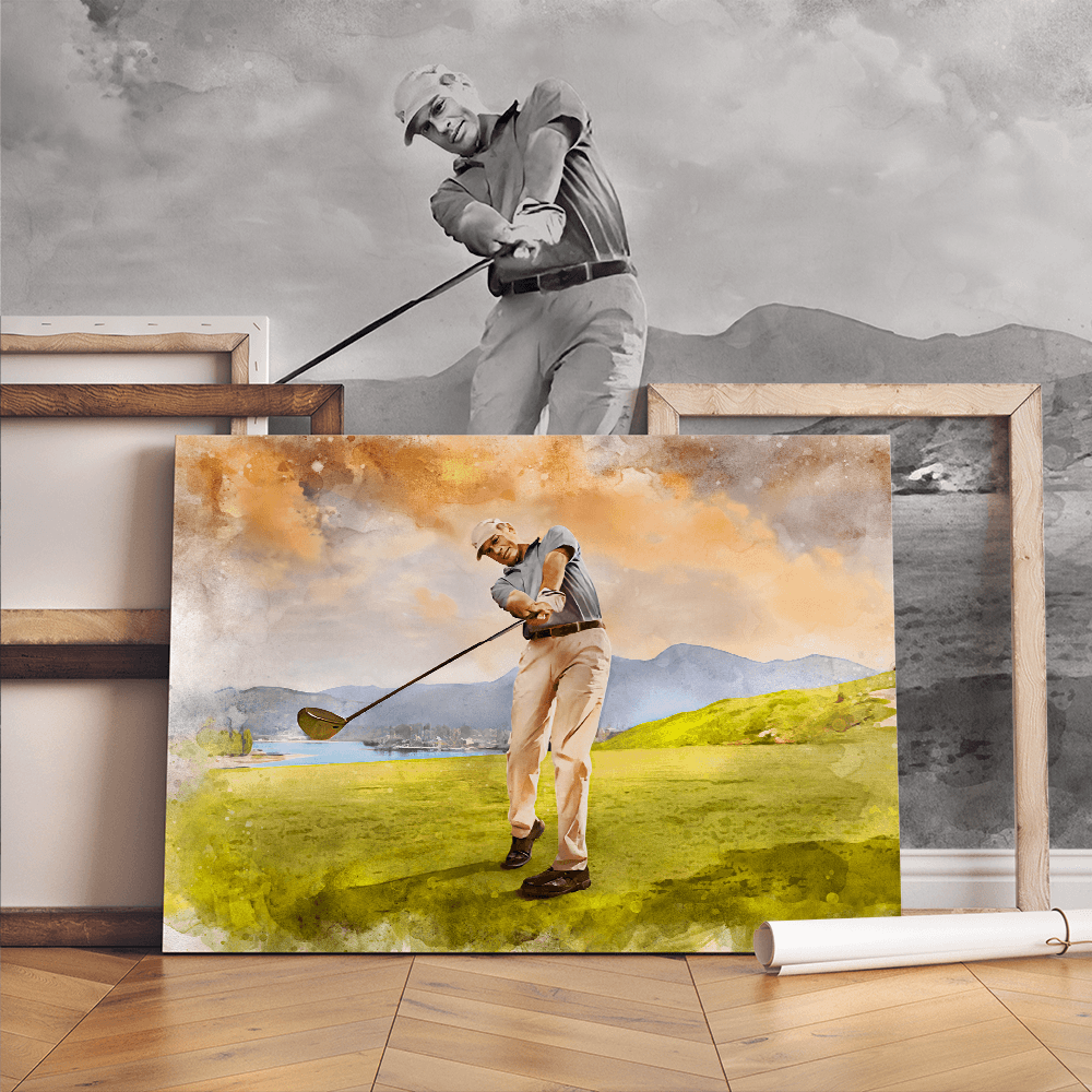 A captivating golf art display features two watercolor renditions of a male golfer mid-swing: one large, colorful painting on the floor, and a smaller, grayscale version mounted on the wall above.