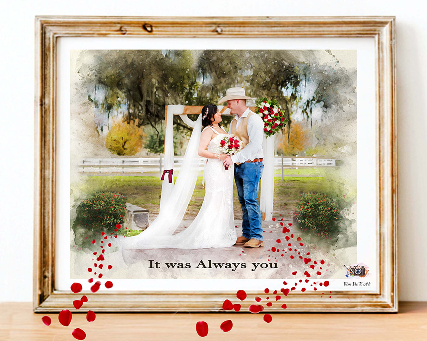 Watercolor wedding portrait by FromPicToArt Couple under floral arch, bride in white, groom in cowboy boots, surrounded by old oaks, Spanish moss, and red petals. Quote It was Always you