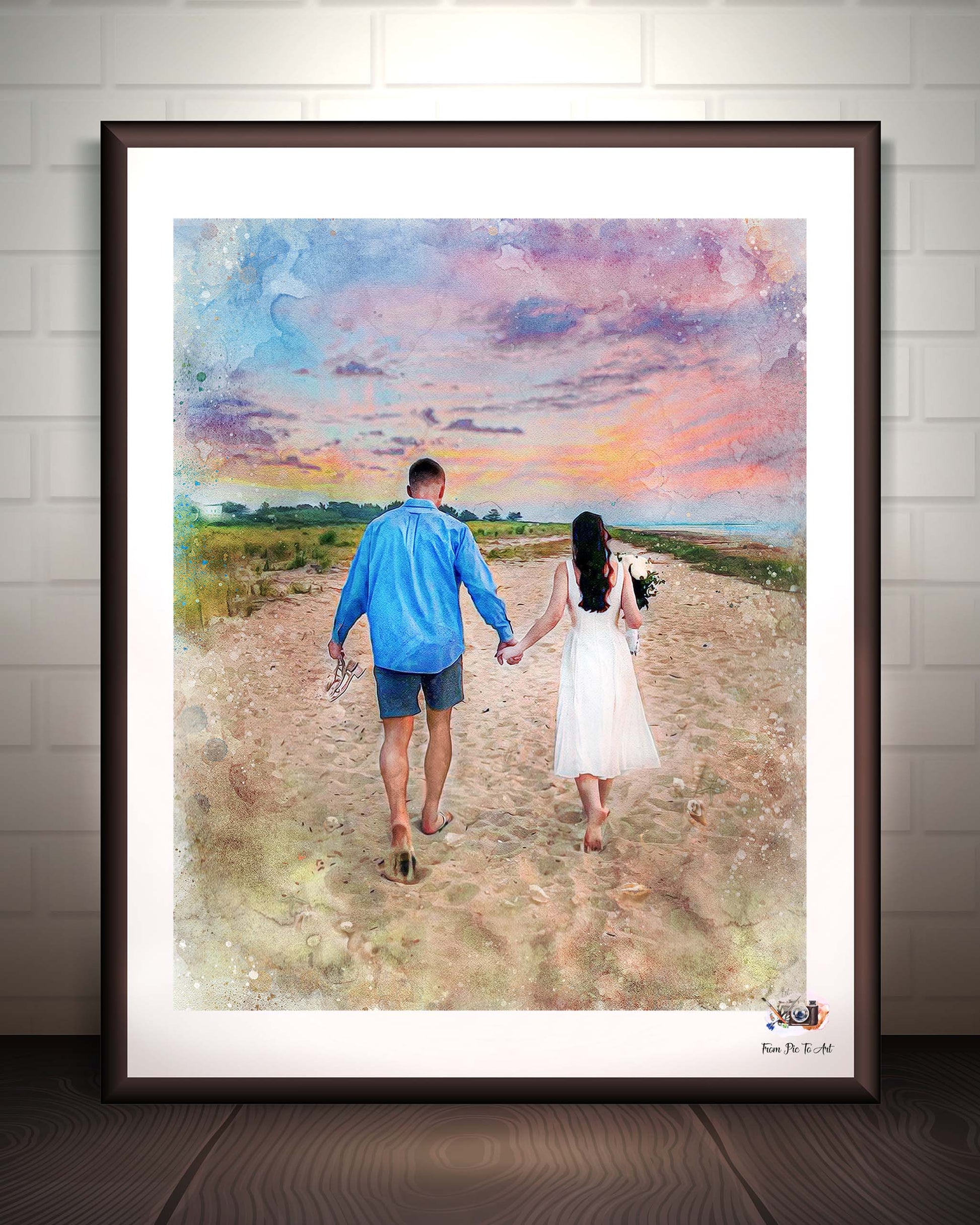 Framed artwork of a couple walking hand in hand on a path with a colorful sky.