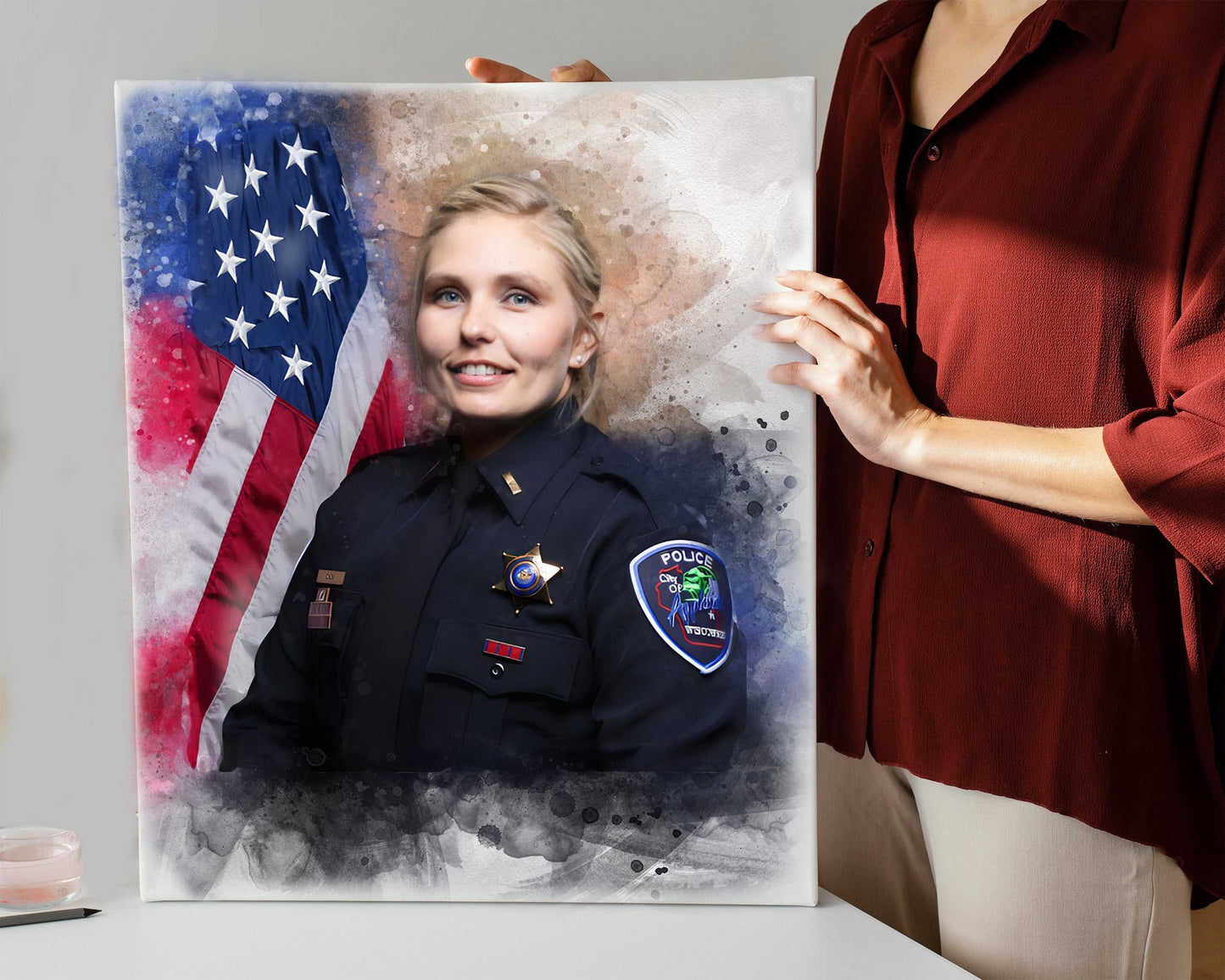 A custom portrait painting with a young female law enforcement officer in front of the US flag as a law enforcement gift.