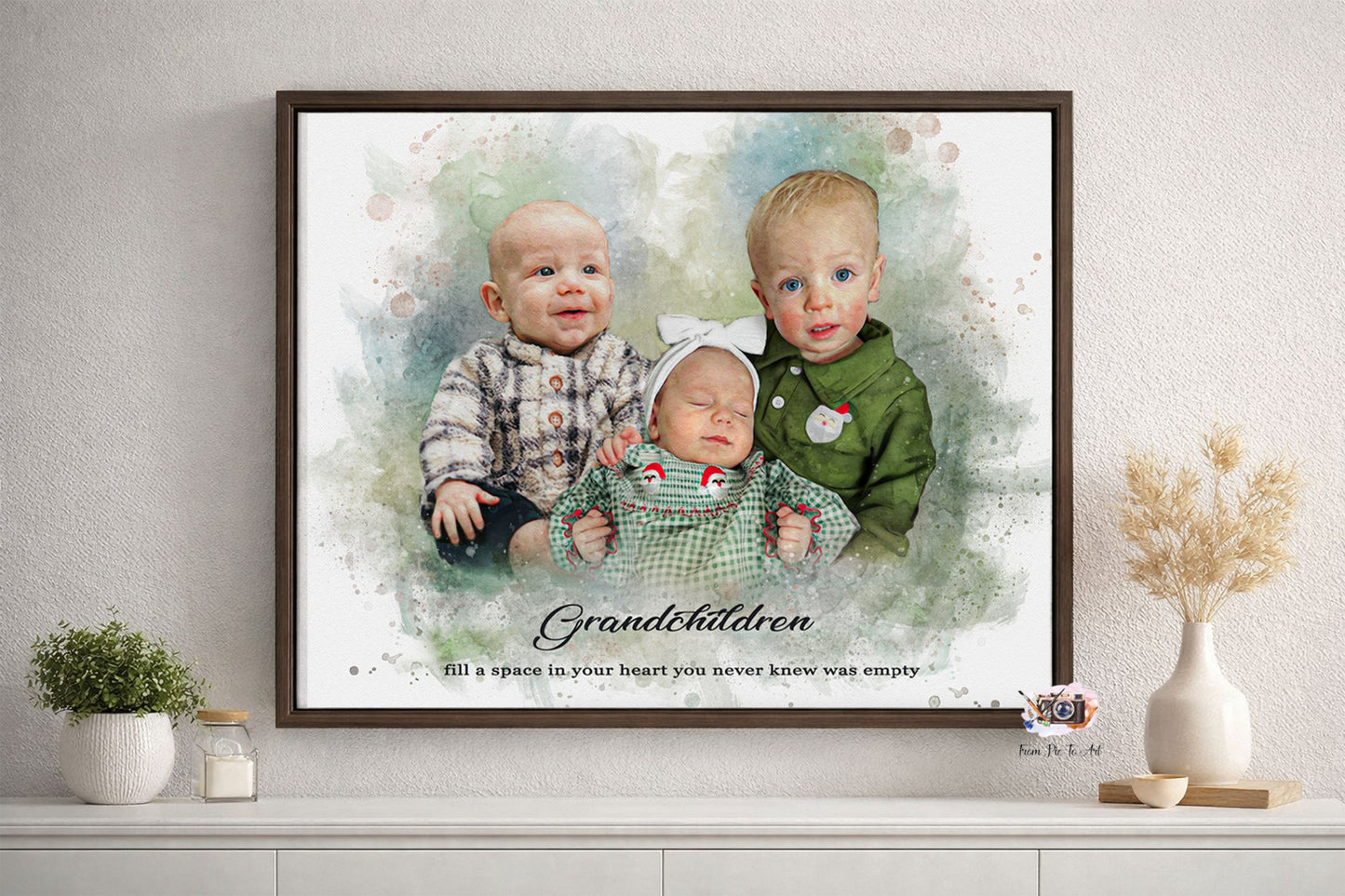 Framed portrait of three children on a wall with decorative elements.